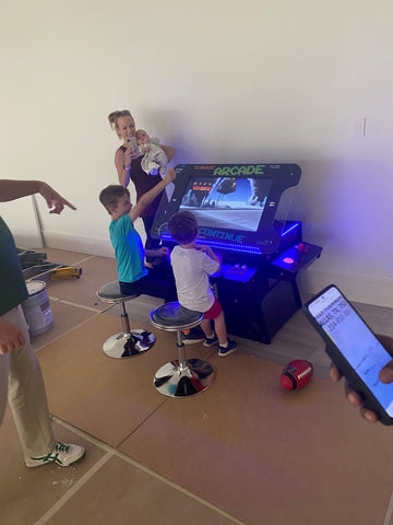 Children Playing Arcade Game