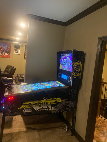 Modern Pinball Machine In A Room